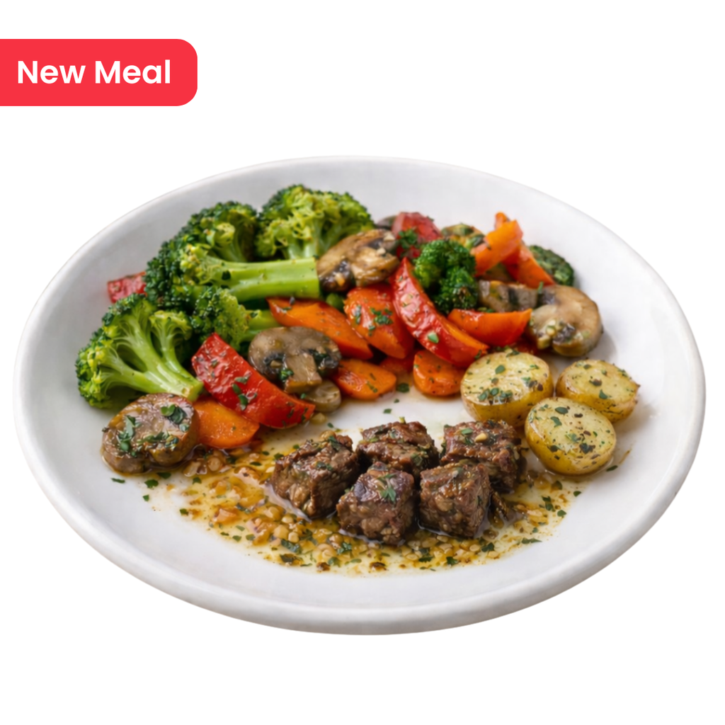 Garlic Butter Steak Bites with Sauteed vegetable Mix & roast Potatoes